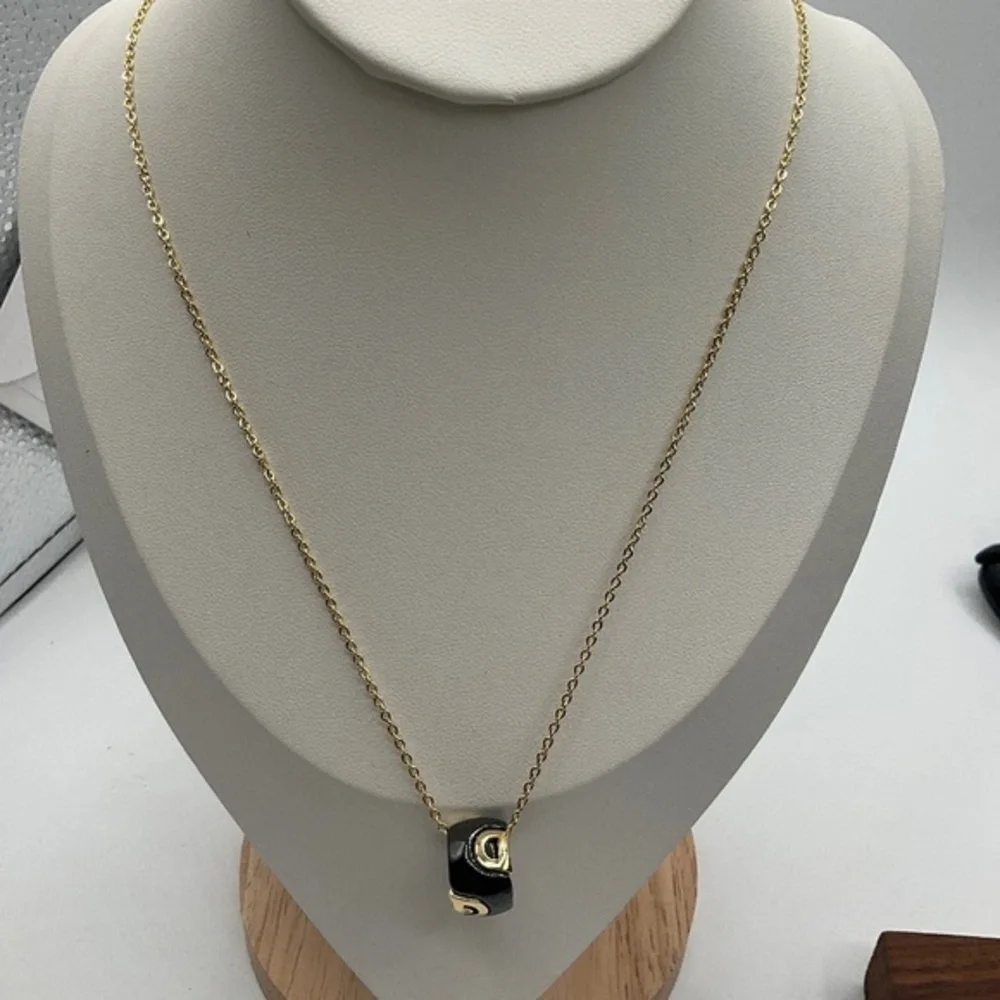 gold-plated necklace with ceramic pendant